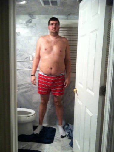 A photo of a 6'7" man showing a snapshot of 308 pounds at a height of 6'7