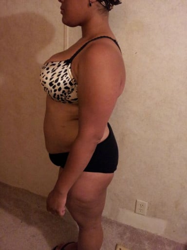 A progress pic of a 5'2" woman showing a snapshot of 162 pounds at a height of 5'2