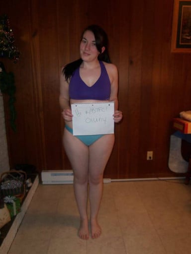 A progress pic of a 5'7" woman showing a snapshot of 163 pounds at a height of 5'7
