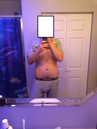 A picture of a 6'1" male showing a weight cut from 206 pounds to 192 pounds. A net loss of 14 pounds.
