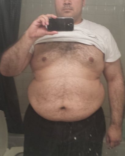 A before and after photo of a 6'0" male showing a fat loss from 335 pounds to 251 pounds. A respectable loss of 84 pounds.