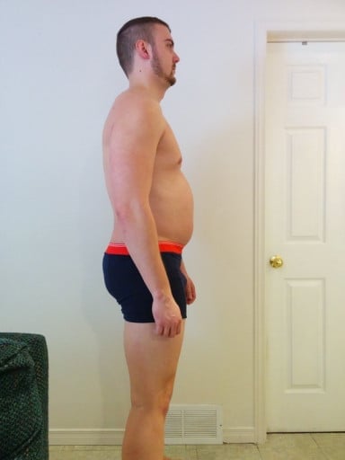 A progress pic of a 6'2" man showing a snapshot of 242 pounds at a height of 6'2