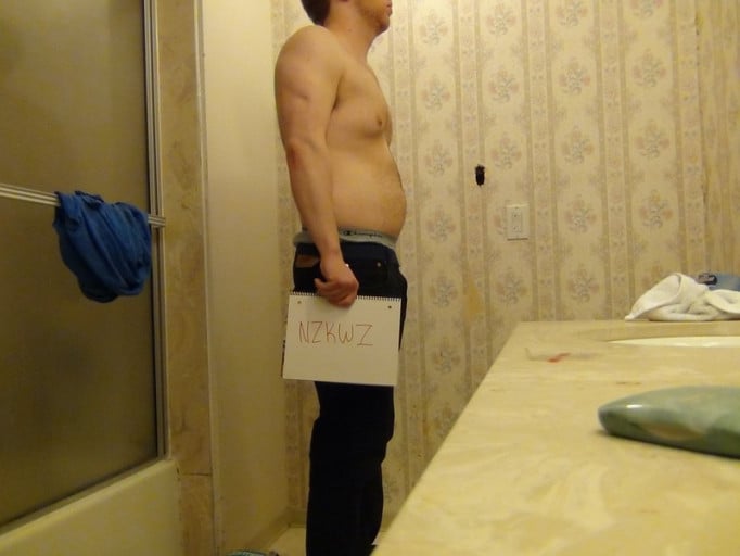 A photo of a 5'11" man showing a snapshot of 205 pounds at a height of 5'11