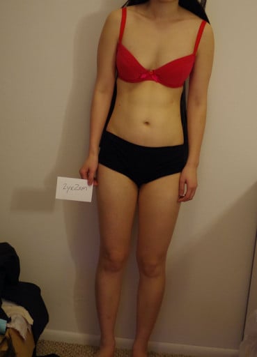 A photo of a 5'2" woman showing a snapshot of 102 pounds at a height of 5'2