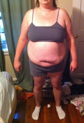 A progress pic of a 5'4" woman showing a snapshot of 214 pounds at a height of 5'4