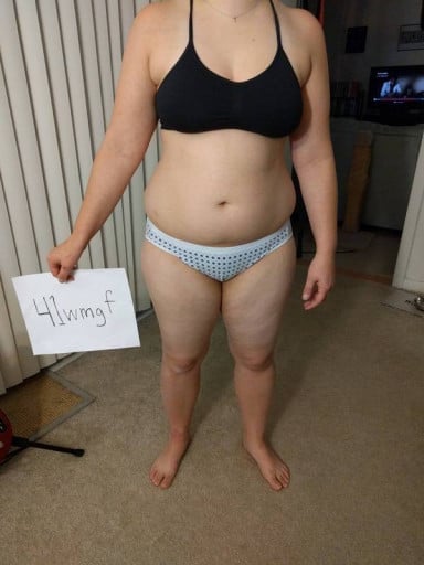 A photo of a 5'2" woman showing a snapshot of 155 pounds at a height of 5'2