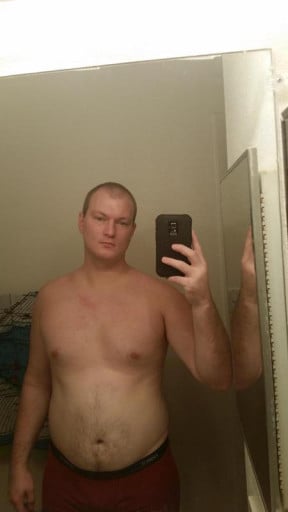 A picture of a 6'0" male showing a fat loss from 227 pounds to 180 pounds. A respectable loss of 47 pounds.