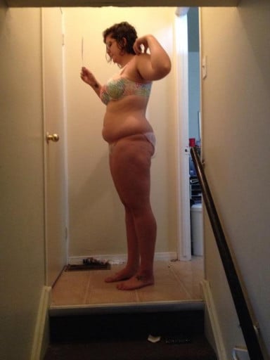 A picture of a 5'9" female showing a snapshot of 209 pounds at a height of 5'9