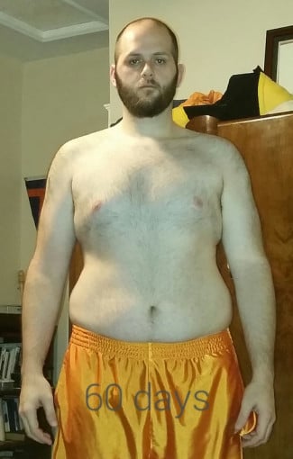 A photo of a 6'4" man showing a fat loss from 263 pounds to 258 pounds. A net loss of 5 pounds.