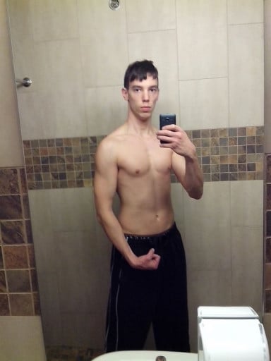 A photo of a 6'1" man showing a weight bulk from 145 pounds to 160 pounds. A total gain of 15 pounds.