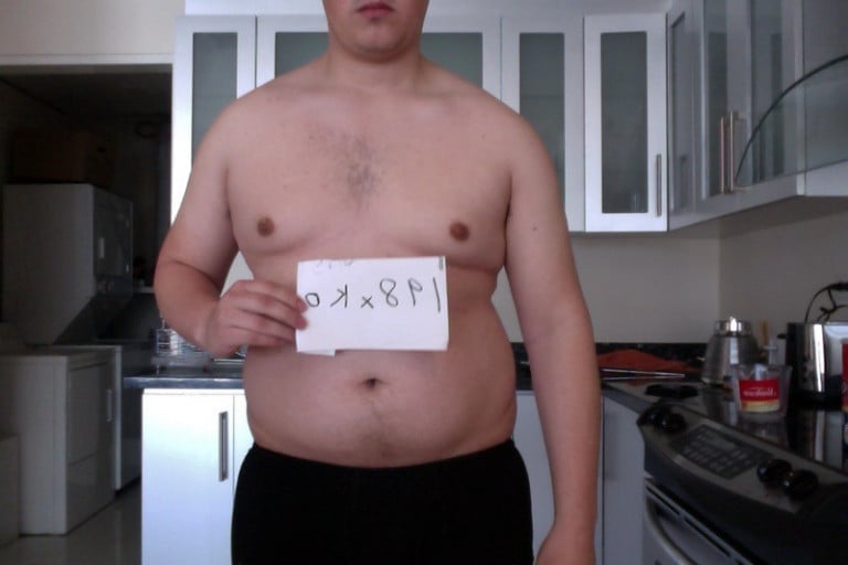 A photo of a 5'11" man showing a snapshot of 220 pounds at a height of 5'11