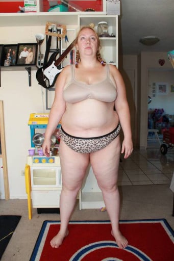 A progress pic of a 5'7" woman showing a snapshot of 265 pounds at a height of 5'7
