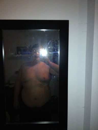 A picture of a 6'0" male showing a weight reduction from 285 pounds to 230 pounds. A net loss of 55 pounds.