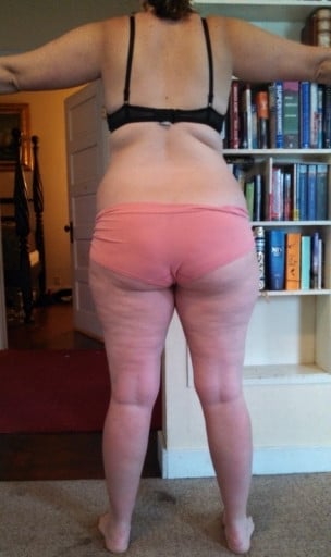 A progress pic of a 5'8" woman showing a snapshot of 203 pounds at a height of 5'8