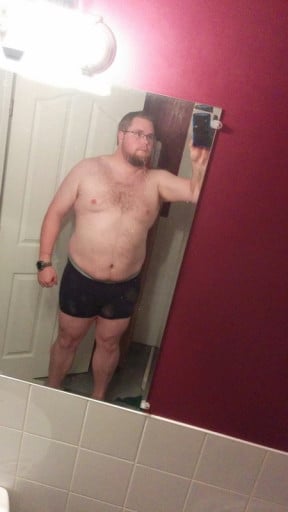 A before and after photo of a 6'3" male showing a fat loss from 331 pounds to 238 pounds. A respectable loss of 93 pounds.