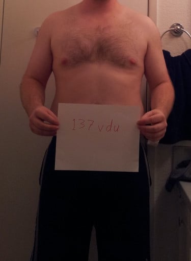 A picture of a 6'0" male showing a snapshot of 221 pounds at a height of 6'0