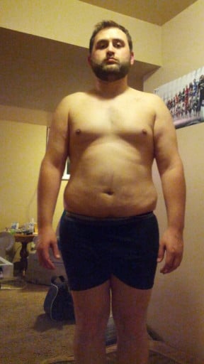 A progress pic of a 5'10" man showing a snapshot of 243 pounds at a height of 5'10