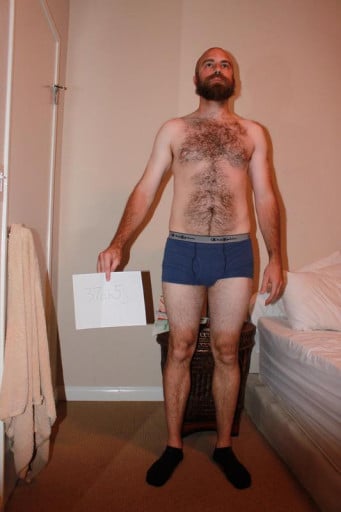 A picture of a 6'1" male showing a snapshot of 184 pounds at a height of 6'1