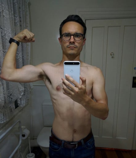 A photo of a 5'7" man showing a muscle gain from 125 pounds to 127 pounds. A respectable gain of 2 pounds.
