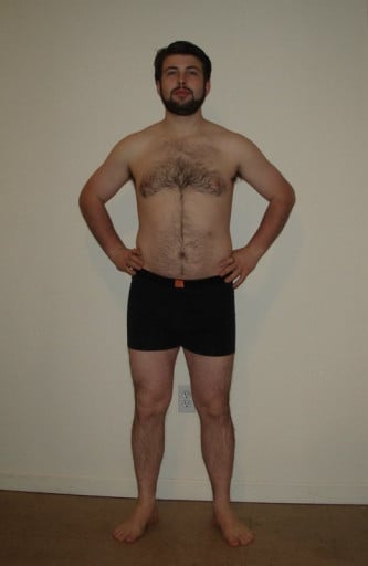 A photo of a 6'0" man showing a snapshot of 211 pounds at a height of 6'0