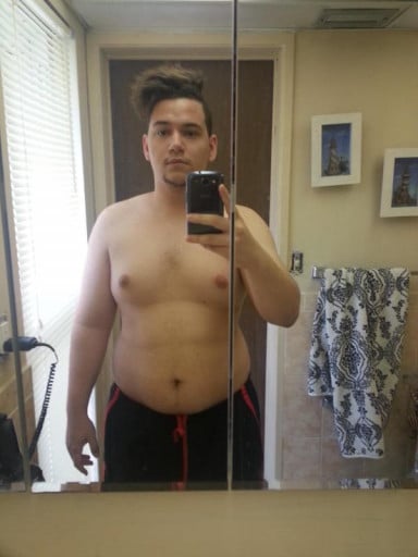 A before and after photo of a 5'9" male showing a weight cut from 257 pounds to 206 pounds. A net loss of 51 pounds.