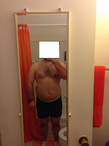 A progress pic of a 5'5" man showing a weight loss from 215 pounds to 207 pounds. A net loss of 8 pounds.