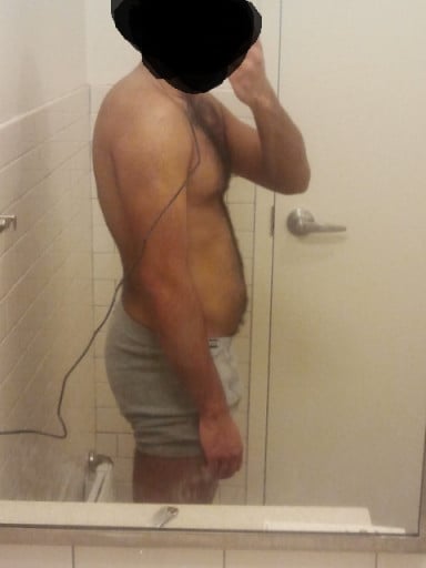 A progress pic of a 5'7" man showing a snapshot of 155 pounds at a height of 5'7