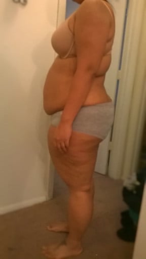 A progress pic of a 5'4" woman showing a snapshot of 236 pounds at a height of 5'4