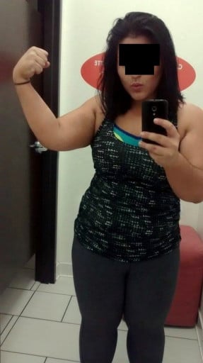 A picture of a 5'3" female showing a weight cut from 225 pounds to 195 pounds. A respectable loss of 30 pounds.