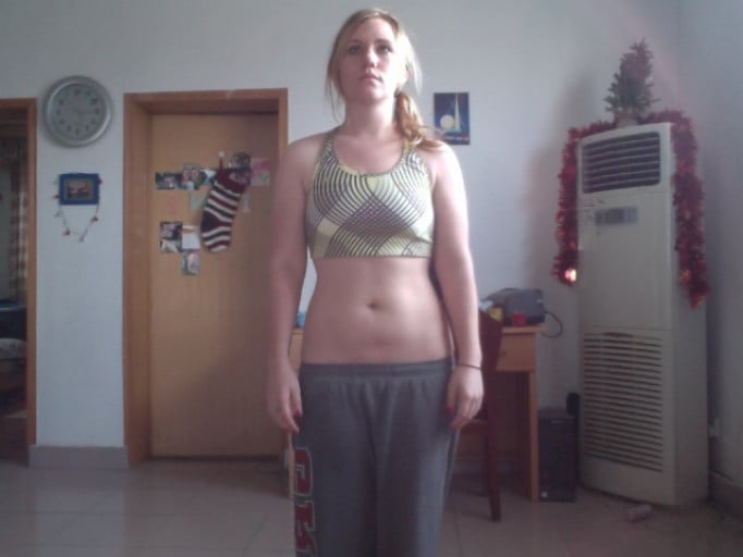 A photo of a 5'2" woman showing a fat loss from 170 pounds to 125 pounds. A total loss of 45 pounds.