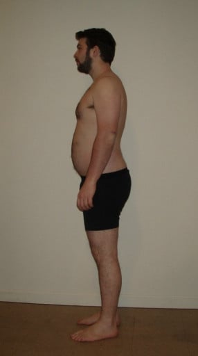 A photo of a 6'0" man showing a snapshot of 211 pounds at a height of 6'0