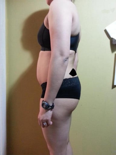 A progress pic of a 5'2" woman showing a snapshot of 130 pounds at a height of 5'2