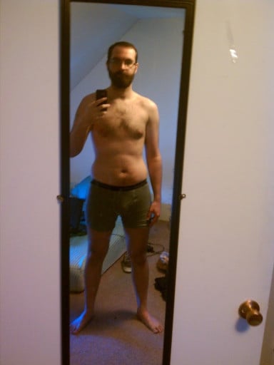 A picture of a 6'2" male showing a weight reduction from 250 pounds to 190 pounds. A net loss of 60 pounds.