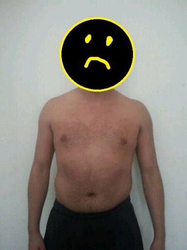 A photo of a 5'11" man showing a weight loss from 198 pounds to 180 pounds. A net loss of 18 pounds.