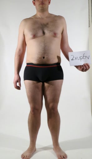 A photo of a 6'0" man showing a snapshot of 220 pounds at a height of 6'0