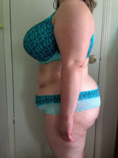 A picture of a 5'1" female showing a weight cut from 237 pounds to 203 pounds. A net loss of 34 pounds.