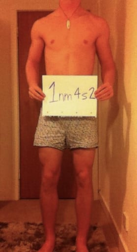 A photo of a 5'11" man showing a snapshot of 155 pounds at a height of 5'11