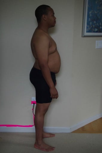 A progress pic of a 5'6" man showing a snapshot of 209 pounds at a height of 5'6