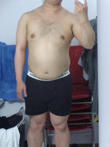A progress pic of a 5'4" man showing a snapshot of 180 pounds at a height of 5'4