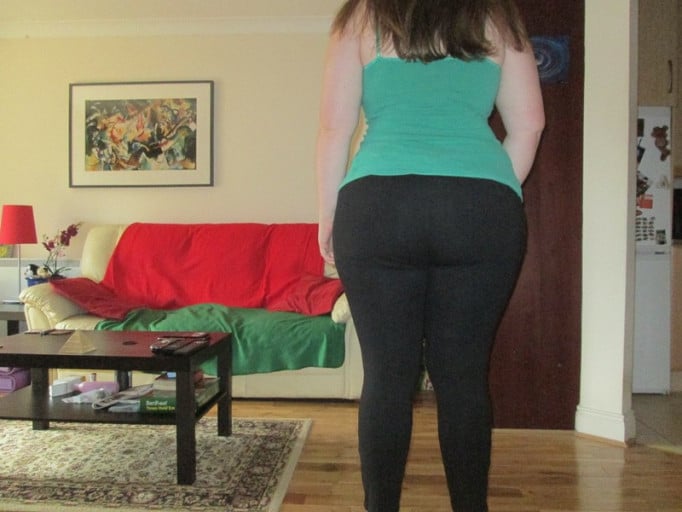 A photo of a 5'11" woman showing a weight loss from 265 pounds to 220 pounds. A total loss of 45 pounds.
