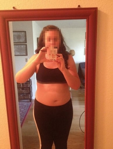 A photo of a 5'10" woman showing a weight reduction from 205 pounds to 177 pounds. A net loss of 28 pounds.