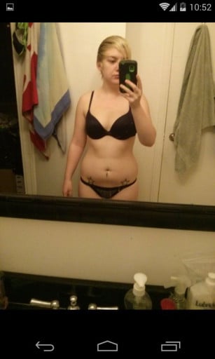 A picture of a 5'4" female showing a weight cut from 154 pounds to 134 pounds. A total loss of 20 pounds.