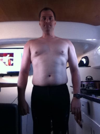 A photo of a 5'11" man showing a weight loss from 222 pounds to 179 pounds. A total loss of 43 pounds.