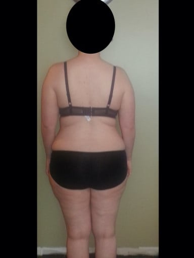 A progress pic of a 5'6" woman showing a snapshot of 194 pounds at a height of 5'6