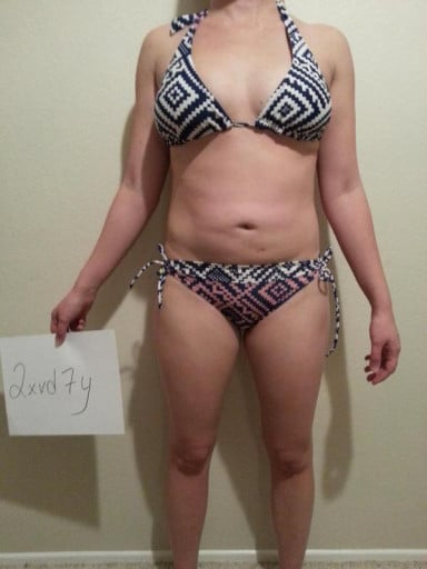 A photo of a 5'3" woman showing a snapshot of 129 pounds at a height of 5'3