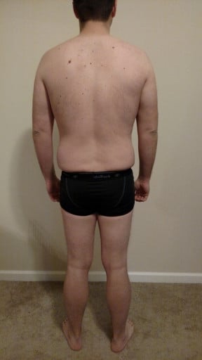 A progress pic of a 6'2" man showing a snapshot of 220 pounds at a height of 6'2