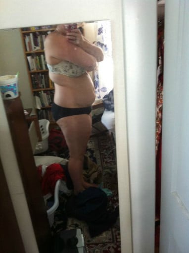 A photo of a 5'9" woman showing a weight reduction from 220 pounds to 205 pounds. A respectable loss of 15 pounds.