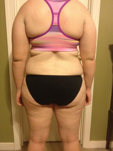 A photo of a 5'2" woman showing a snapshot of 164 pounds at a height of 5'2