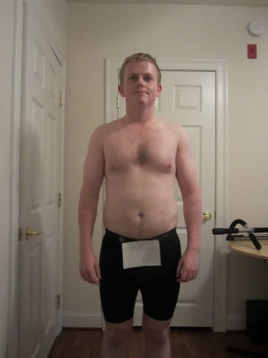 A photo of a 5'7" man showing a snapshot of 158 pounds at a height of 5'7