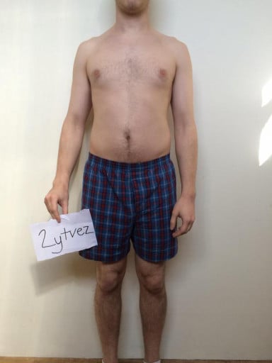 A photo of a 5'10" man showing a snapshot of 155 pounds at a height of 5'10